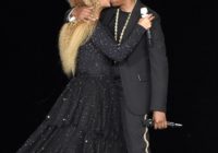 Beyonce and Jay Z share a kiss on stage at their New Jersey concert