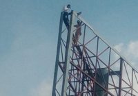 Police arrest Adamawa man who climbed billboard hanger with threats to commit suicide if Buhari doesn’t vacate his office